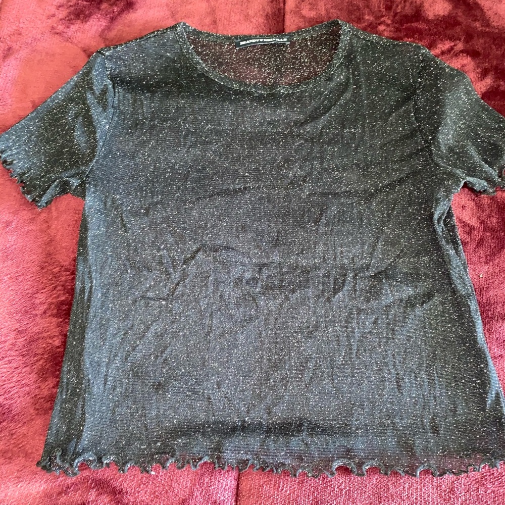 Black sheer top with glitter detail!